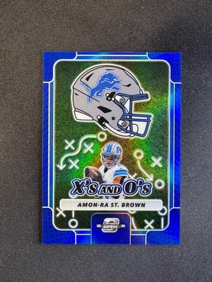 2024-25 Contenders Optic Amon-Ra St. Brown Xs and Os Blue Prizm #XO-ASB #d 39/99
