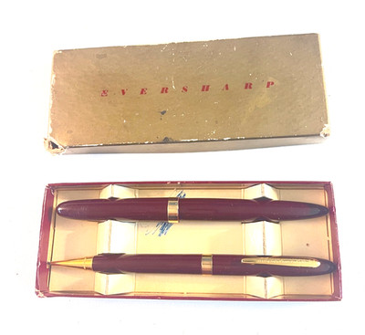 Burgundy Eversharp ball pen and pencil set in original box.  Excellent condition