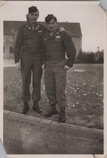 WW2 Photo of 2 US Army Soldiers Standing Together Outside Barracks