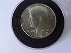 A 1968 D Kennedy Half Dollar 40% SILVER US Mint "Circulated" In a Capsule.