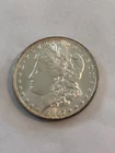1887-O MORGAN SILVER DOLLAR CH BU (Rim Toning)