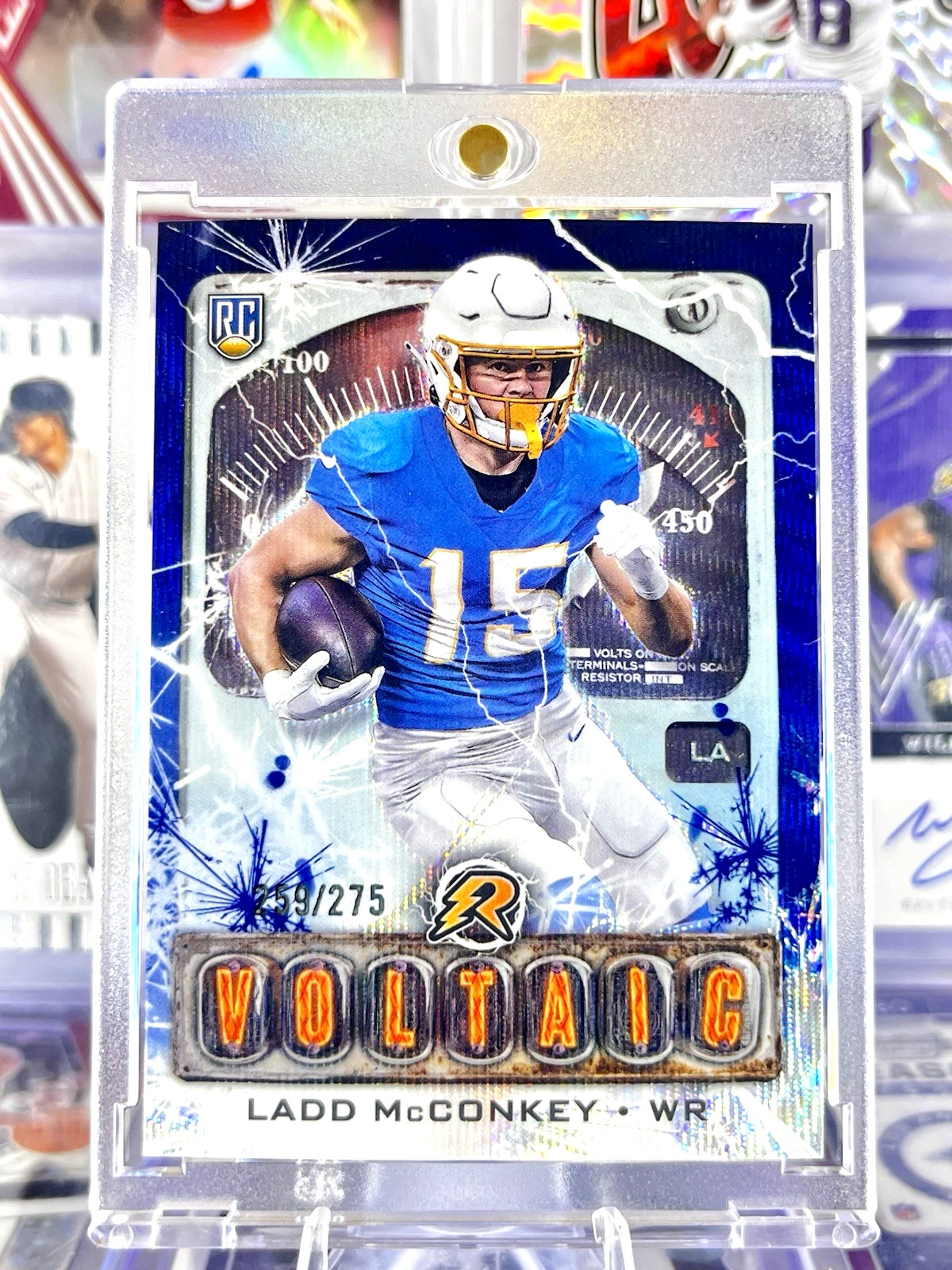 2024 Topps Resurgence Voltaic Ladd McConkey #V-12 Navy Surge Refractor /275 (RC)