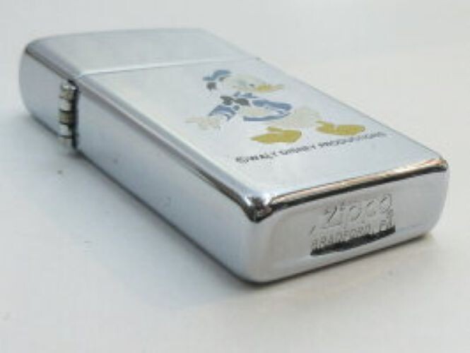 Vintage Zippo Donald Duck Slim 1981, Polished Finish, VG Vintage Zippo Donald Duck Slim 1981, Polished Finish, VG