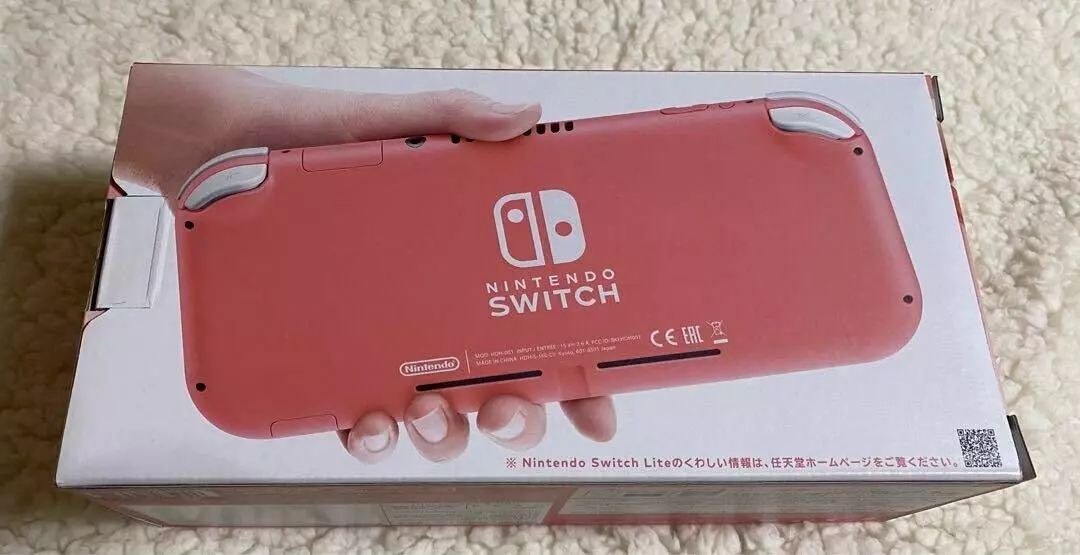 Nintendo Switch Lite Coral Pink Handheld System Gaming Console