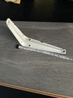 A single  9 Inch L Shape Wall Shelf Brackets  white