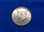 1964 Kennedy Half Dollar (black)