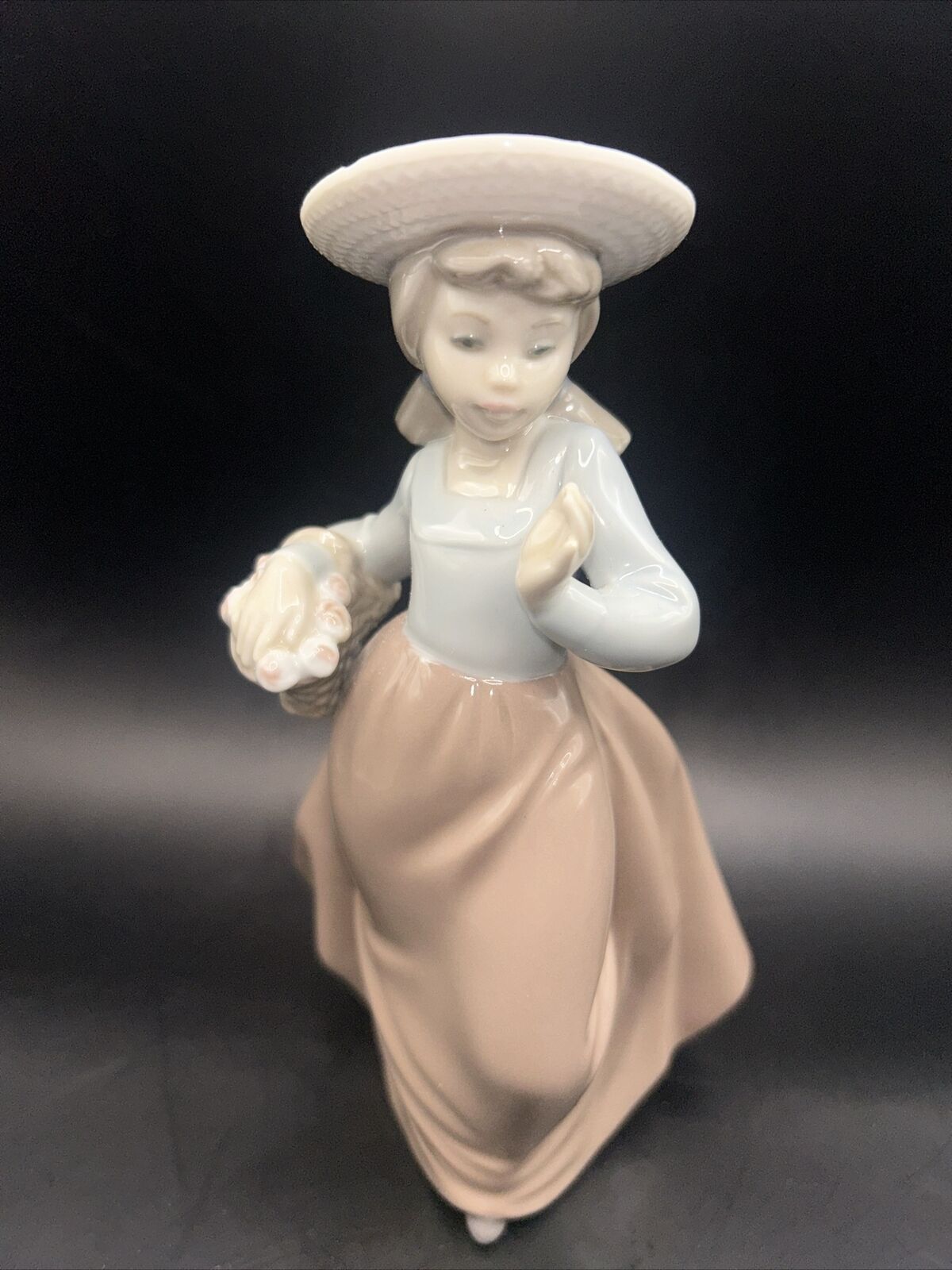 NAO by Lladro Girl With Basket Of Flowers Porcelain Figurine 7.25” Tall