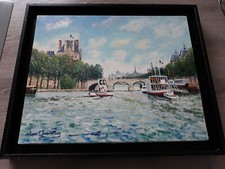 Tableau de Yetvart Kaprielian "la Seine" Paris encadré en caisse américaine.