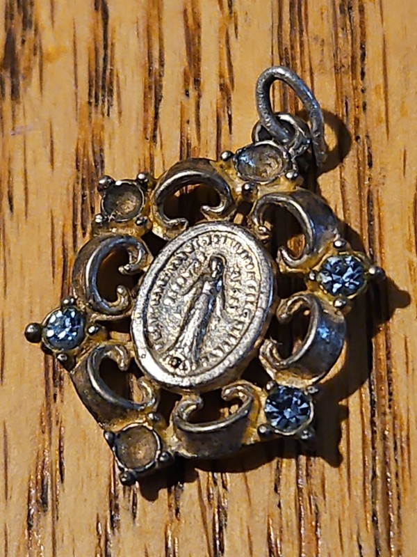 Antique catholic Saint miraculous Mary pendant.  Sold As Is.