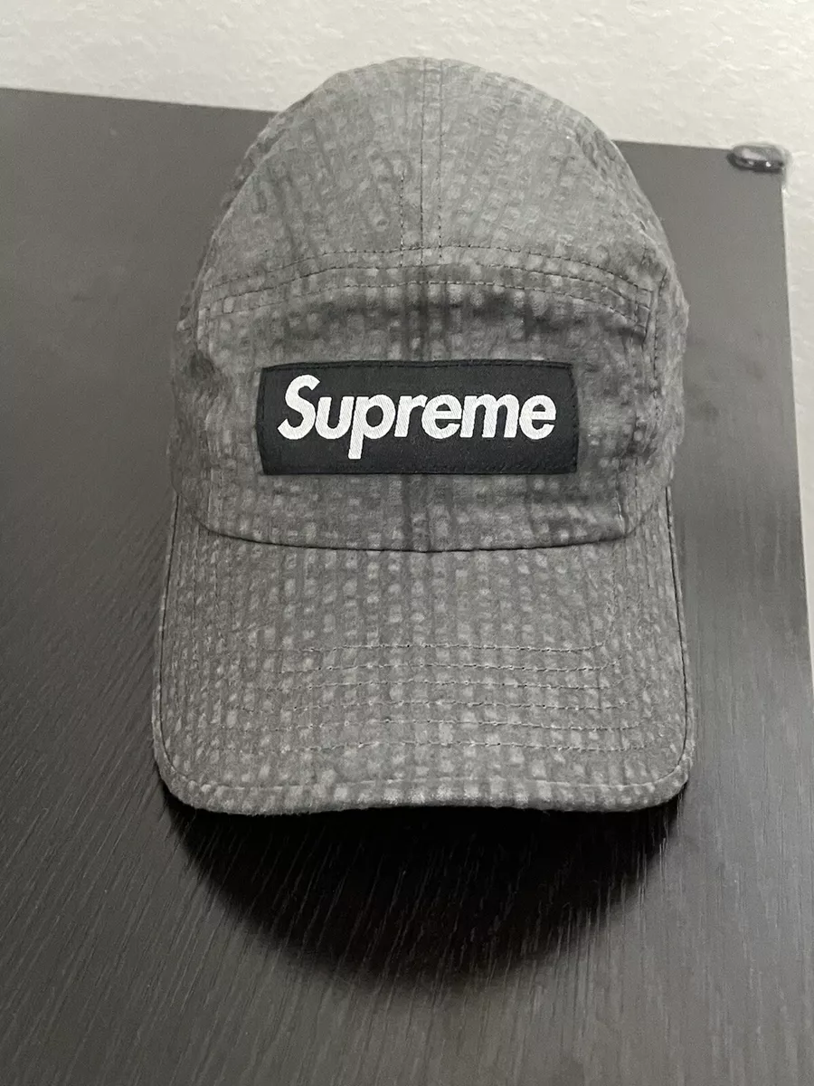 supreme camp cap on head