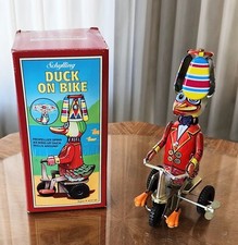 Vintage Toy Schylling Collector Series Windup DUCK ON BIKE Spinning Top with Box