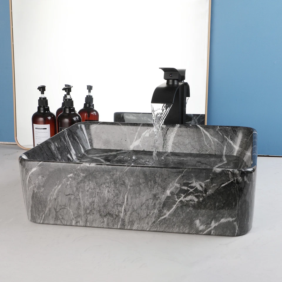 Combo de grifo de drenaje de grifo negro ovalado de mármol para baño de cerámica Foto 2 de 4