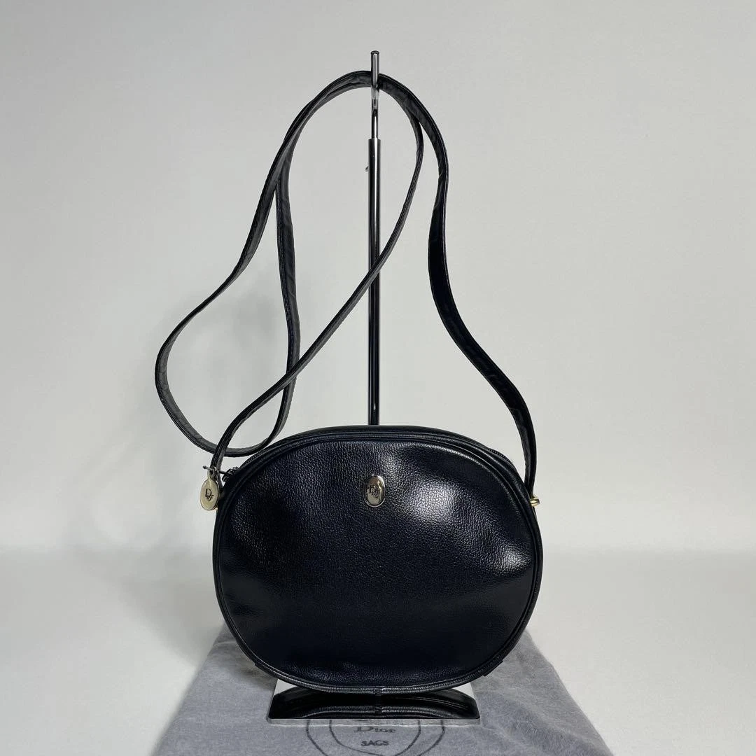 Sac bandoulière Christian Dior en cuir noir avec quincaillerie logo Trotter