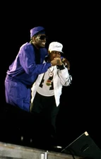 Rapper Kool Moe Dee is joined on stage by Public Enemy's Chuck D a- Old Photo