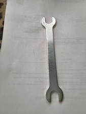 Based on the image provided, this tool is an open-end wrench, also commonly...