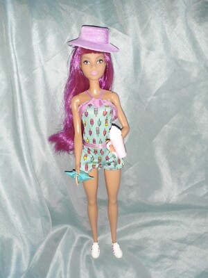Lovely Barbie Pink Haired doll with hat and bag by Mattel