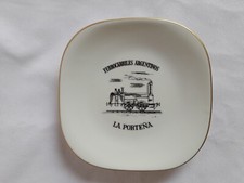 Placa con la imagen de La Porteña, Ferrocarriles Argentinos. primer tren