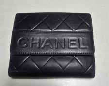 Chanel Quilted Embossed Logo Flap Wallet Black Leather