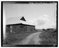 BARN EXTERIOR PERSPECTIVE WEST FAÇADE FROM ACCESS ROAD, LOOKING EAST.