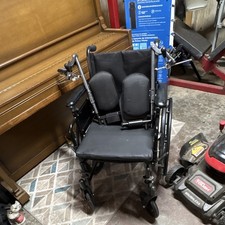 Black Steel Manual Wheelchair Adjustable Armrests Detachable Footrests