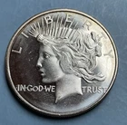 One Troy Ounce Silver Dollar - Brilliant Uncirculated Peace Round. Beautiful