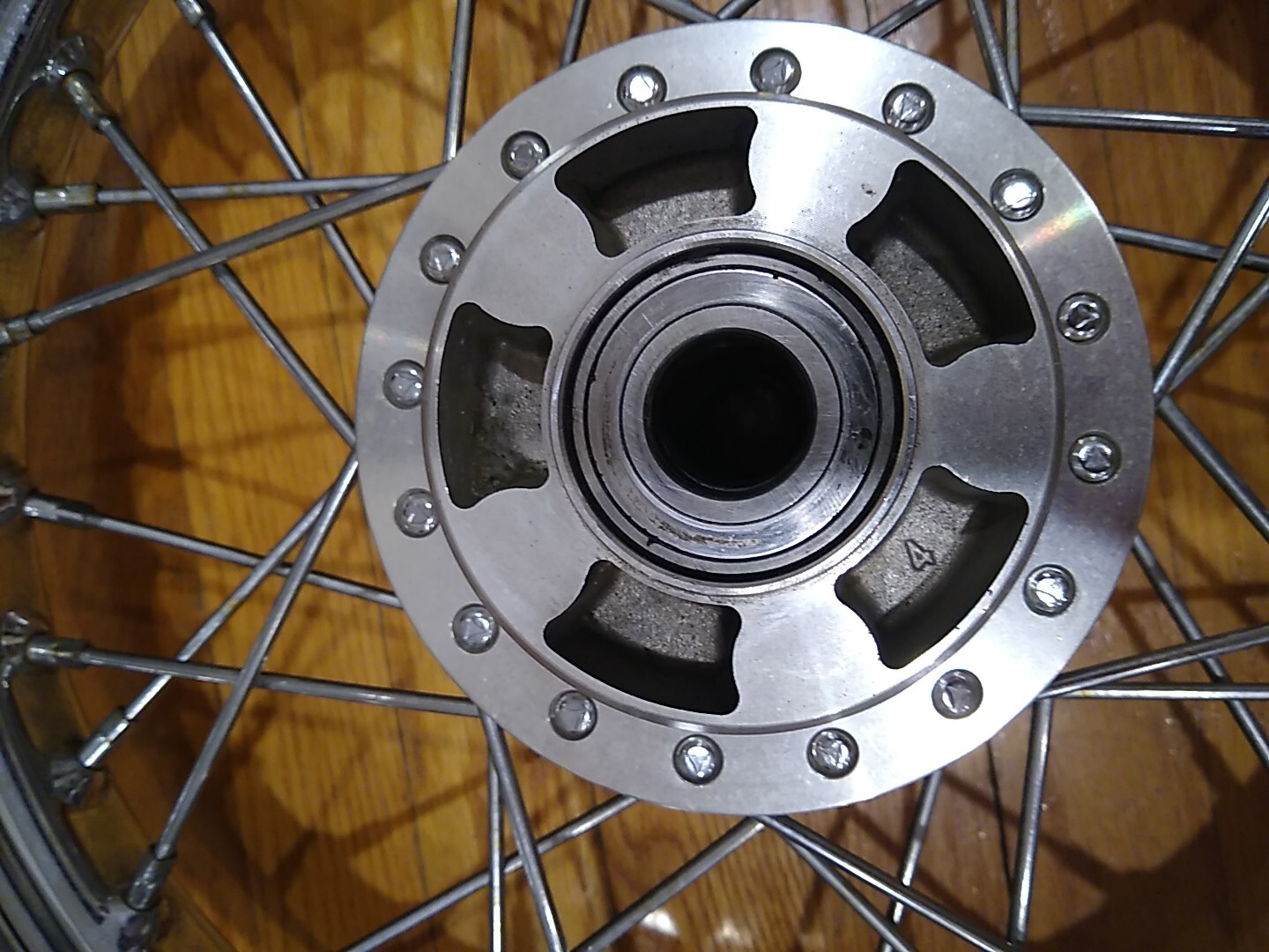 SPORTSTER FRONT WHEEL 16 X 3.00, CHROMED STEEL LACED WITH BEARINGS