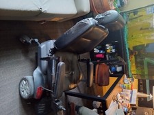 Titan electric power wheelchair, red and black, Good condition.