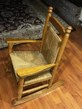 CRACKER BARREL CHILD'S HARDWOOD AND WOVEN SEAT/BACK ROCKING CHAIR
