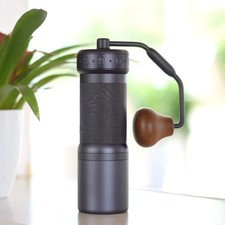 Portable manual burr coffee grinder with adju...