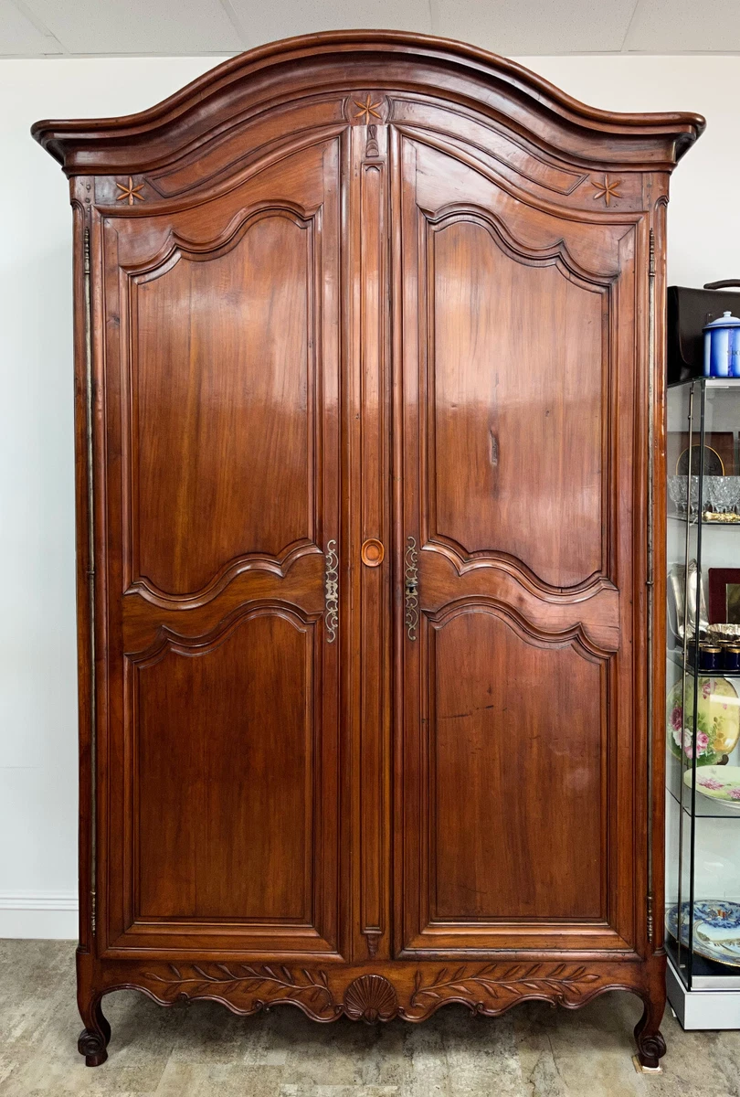 Louis XV large wardrobe in cherry from the early 19th century dated 1802