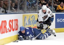 Kyle Wellwood Toronto Maple Leafs maintains control puck aft- Ice Hockey Photo