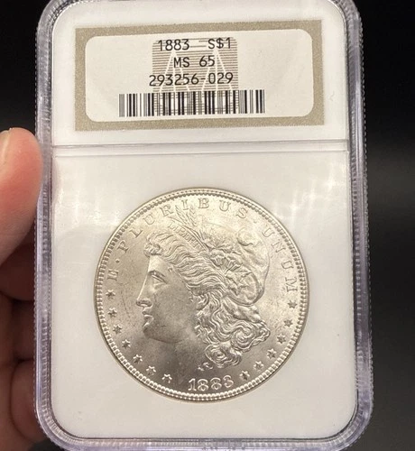 1883 P Morgan Silver Dollar, NGC graded MS65. WHITE!