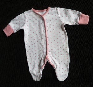 tiny baby clothes next