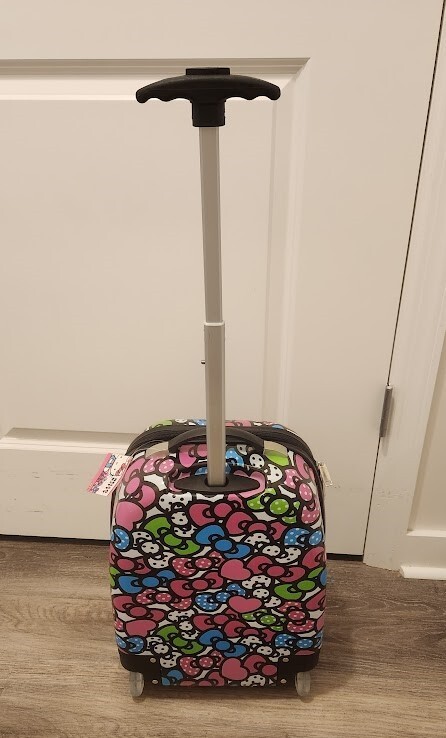 Hello Kitty Rainbow Bows Hard ABS Rolling Carry-on Luggage Sanrio