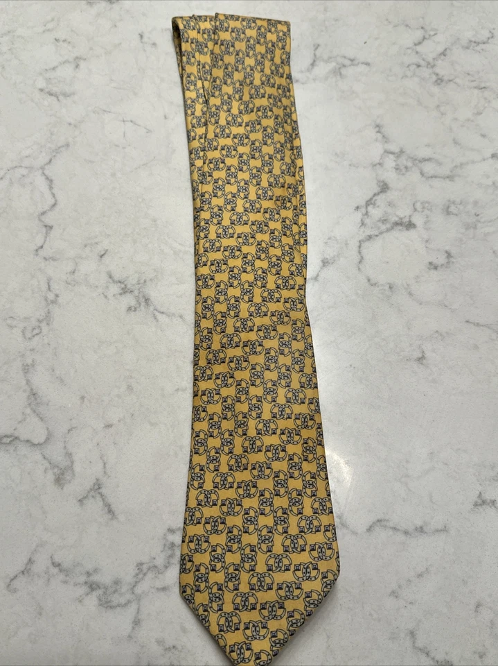 Corbata Gucci Gg patrón entrelazado de oro amarillo Foto 2 de 4