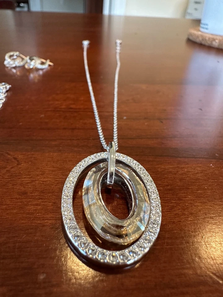 SWAROVSKI Crystal Logan Golden Shadow Pendant Necklace, Bangle, and Earrings - Image 4 of 4