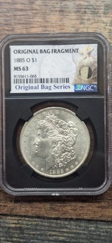 1885-O Morgan Silver Dollar Original Bag Fragment NGC MS63