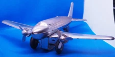 SCHYLLING COLLECTORS SERIES DC-3 AIRPLANE 9 INCH CHROME PLATED TIN PLANE