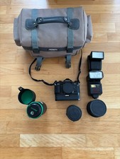 Canon Kamera Konvolut - Canon A-1 + Objektive + mehr 