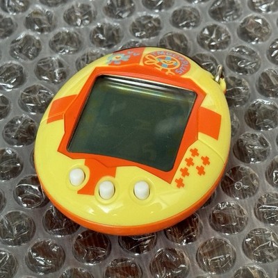 Bandai 2004 Tamagotchi Connection Plus V1 Yellow & Orange Cross