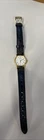Women’s Seiko Gold + Black Leather Quartz Watch