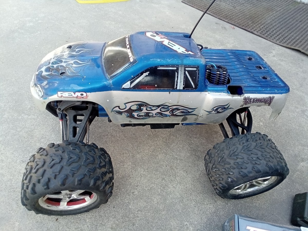 USED TRAXXAS REVO 3.3 NEW ENGINE WITH REMOTE READ