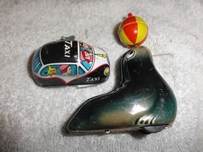 Vintage Lehmann AHA 910 Circus Seal w/ Ball Tin Friction Toy  Wind-Up Taxi Car