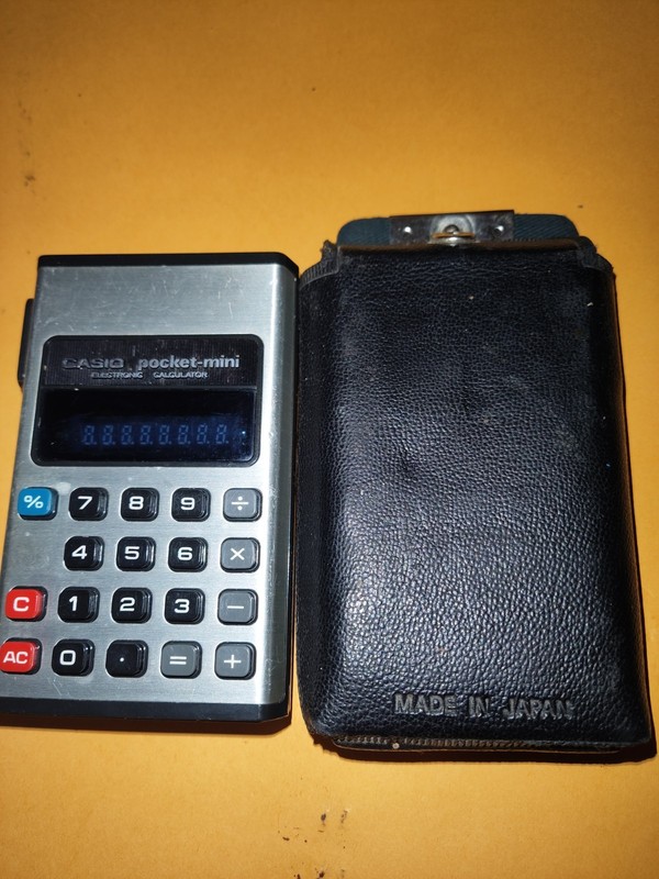 CP-801C Casio pocket mini Calculator W/Case and Brochure Made in Japan