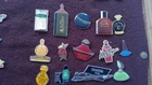 lot of pins on perfumes