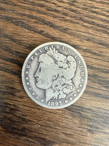 1897-O Morgan Silver Dollar $1 | New Orleans Mint | 90% Silver | Circulated VG/F