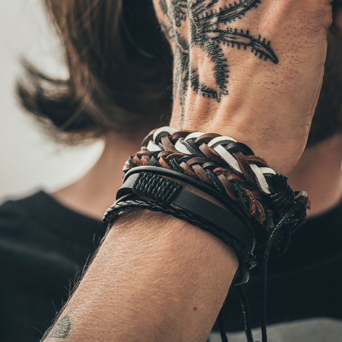 Black leather bracelet with matte silver clasp -