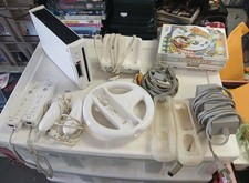 Nintendo Wii Console Bundle with 2 Remotes, 2 Nunchuks, Steering Wheel, 4 Games