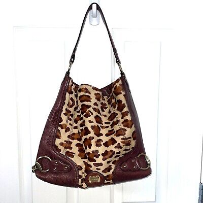 MICHAEL Michael Kors Michl Michl Kors Hamilton Traveler Leopard Print  Messenger Bag, $456 | farfetch.com | Lookastic