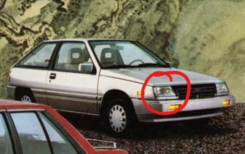 NOS 1987-88 Dodge Colt RH Headlight Bulb Assy w/ Bracket 89-92 Canada Market 100 - Image 2 of 4